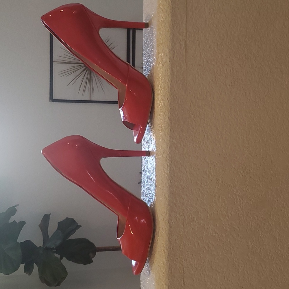 Coral color open toe pumps